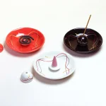 ceramic red incense stand red, white and black colour