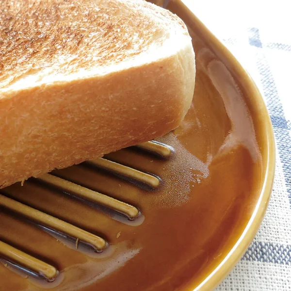 棕色小貓坑紋吐司碟