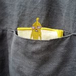 yellow handkerchief inside a shirt's pocket