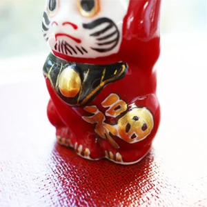 日本製造九谷燒達摩貓擺設身上印有「福」字
