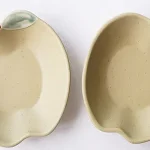 兩個開心果色Yoshizawa 益子燒蘋果小盤的正面