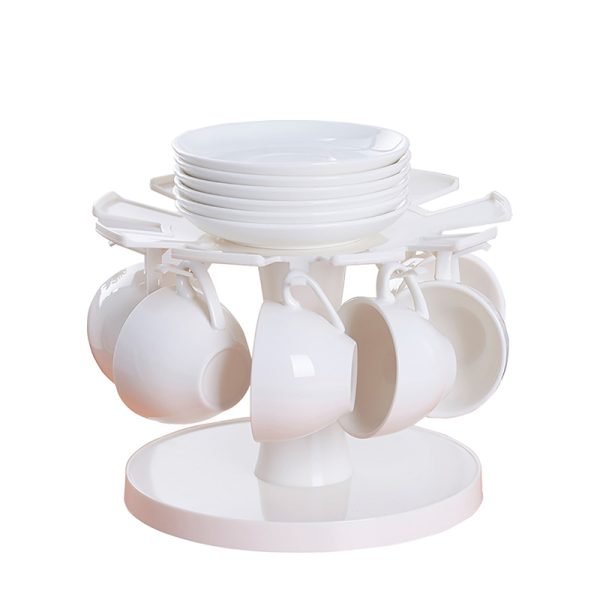 ODyTIGER CROWN 旋轉咖啡杯碟架掛滿咖啡杯及頂部放着碟子的白色背景圖