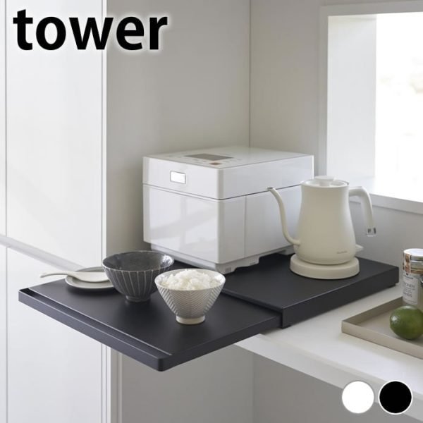黑色款TOWER 廚房伸縮工作枱放在廚房使用的示範圖片