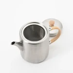 Kobo Aizawa BP straight teapot with the lid on its side, showing the tea strainer inside.