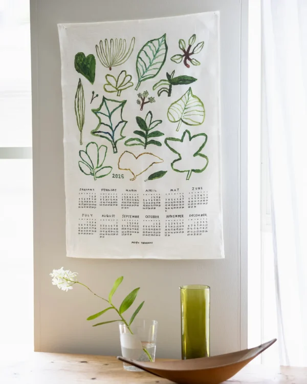 Fog Linen Work 2026 亞麻年曆布 - Green Plants 掛在白色牆上